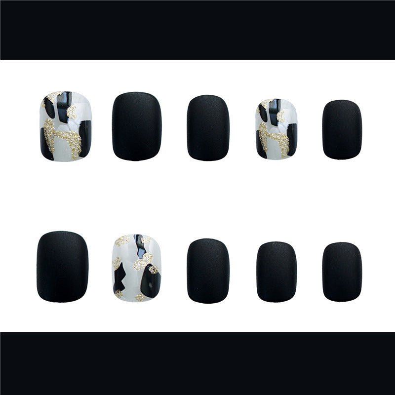 Wearing Black Frosted Shell Fake Nails - TapLike