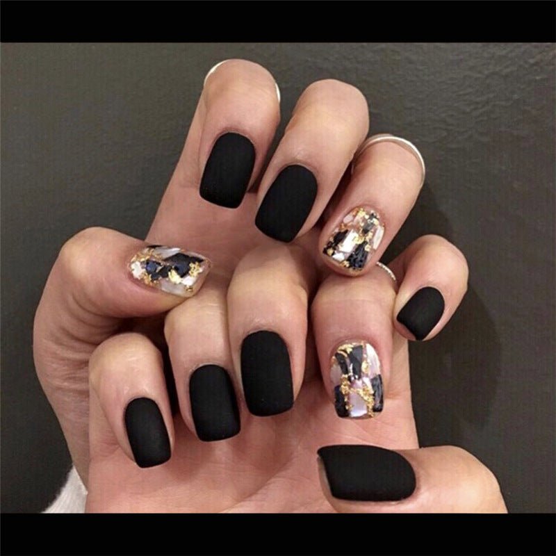 Wearing Black Frosted Shell Fake Nails - TapLike